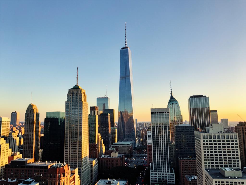 Manhattan skyline with One World Trade Center at golden hour